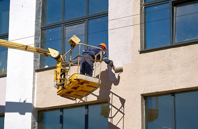 a painter painting a commercial space