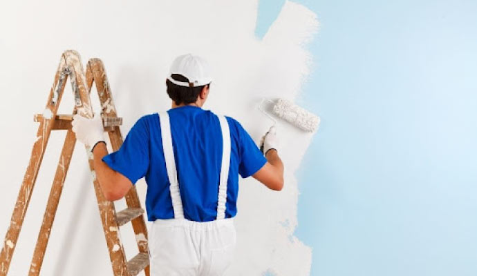 a professional painting an interior