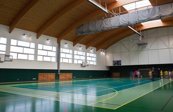 a collage comparing worn out paint with joyful and freshly painted recreational facility