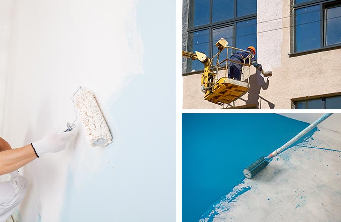 Close-up of paint roller, workers on platform, and blue floor painting